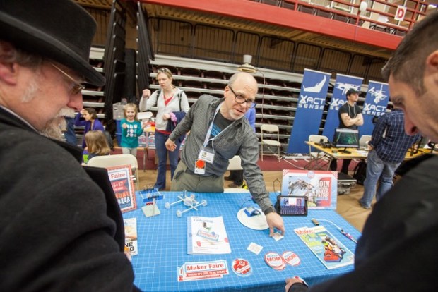 Rich Watrous (left) checks out Make: editor Brian Jepson's spiel